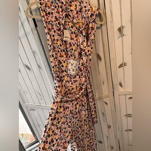FreePeople floral NEVER WORN!!!!worn before jumpsuit size, small tag still on!